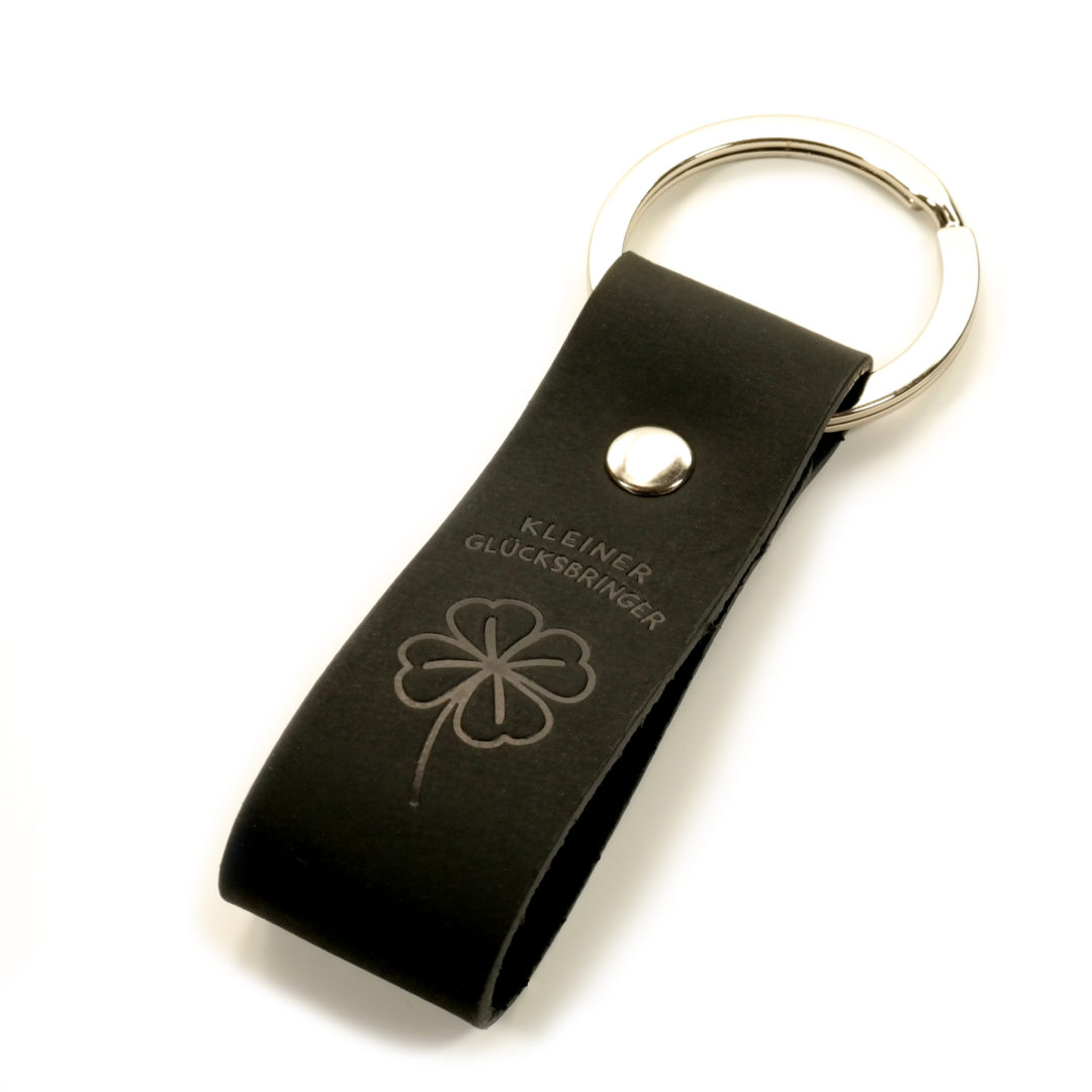 Design Schlüsselanhänger Kleiner Glücksbringer aus schwarzem Leder